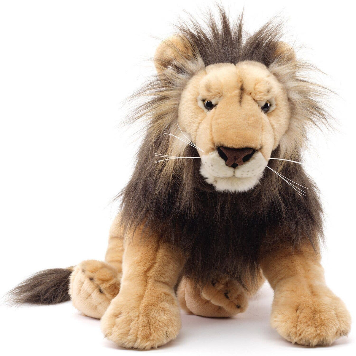 Lying lion plush