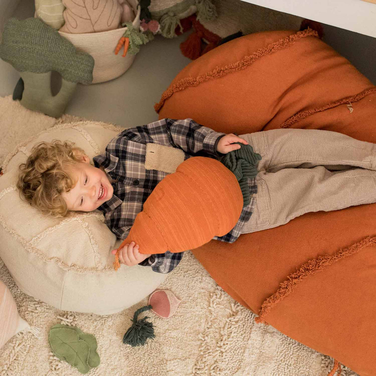Cathy the Carrot knitted cushion