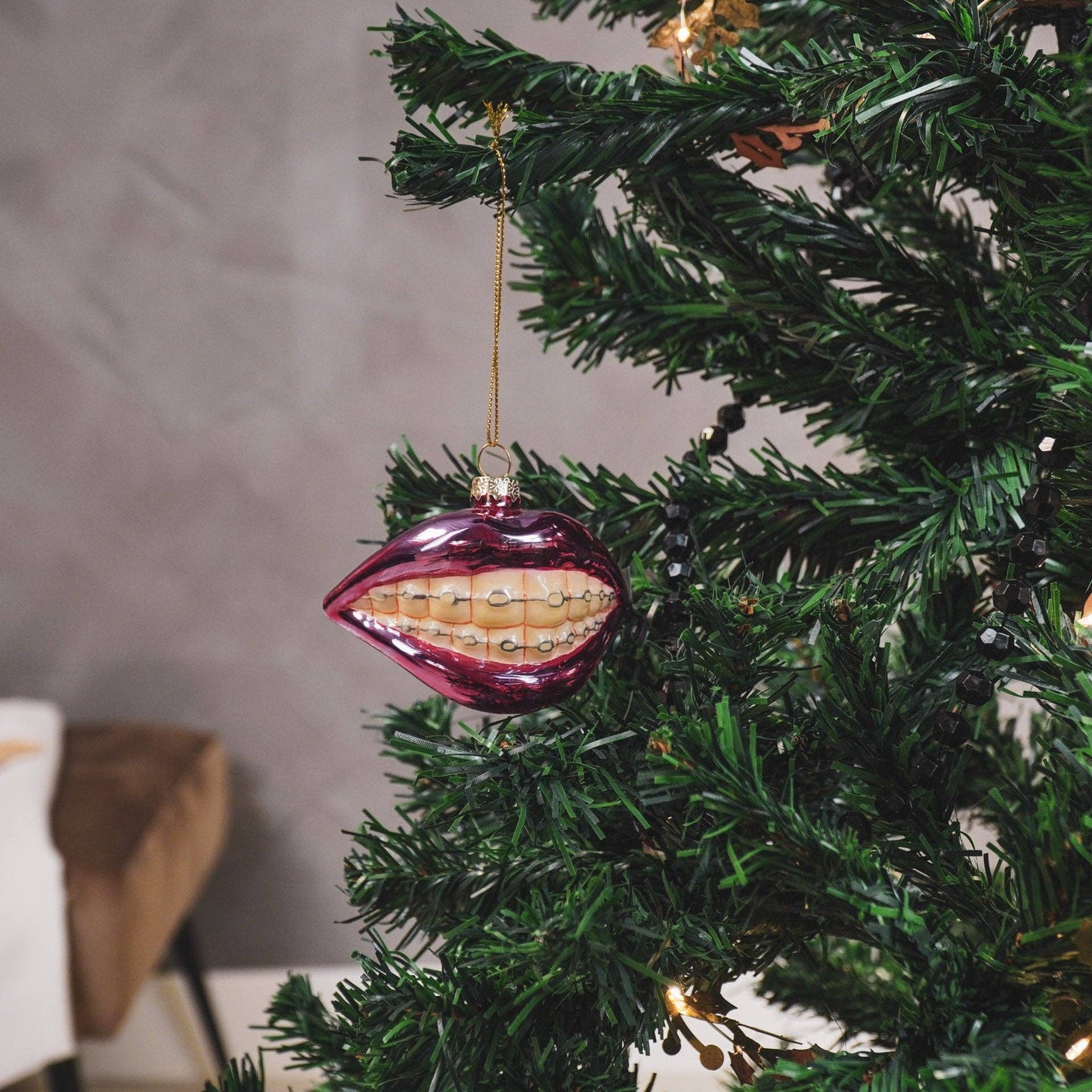 Boule de Noël Bouche avec appareil dentaire