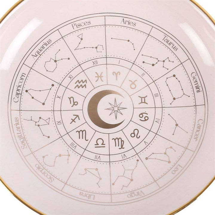 Plat à babioles en forme de roue astrologique blanc cassé