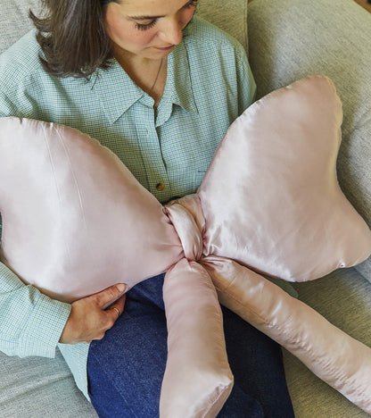 Satin knot cushion