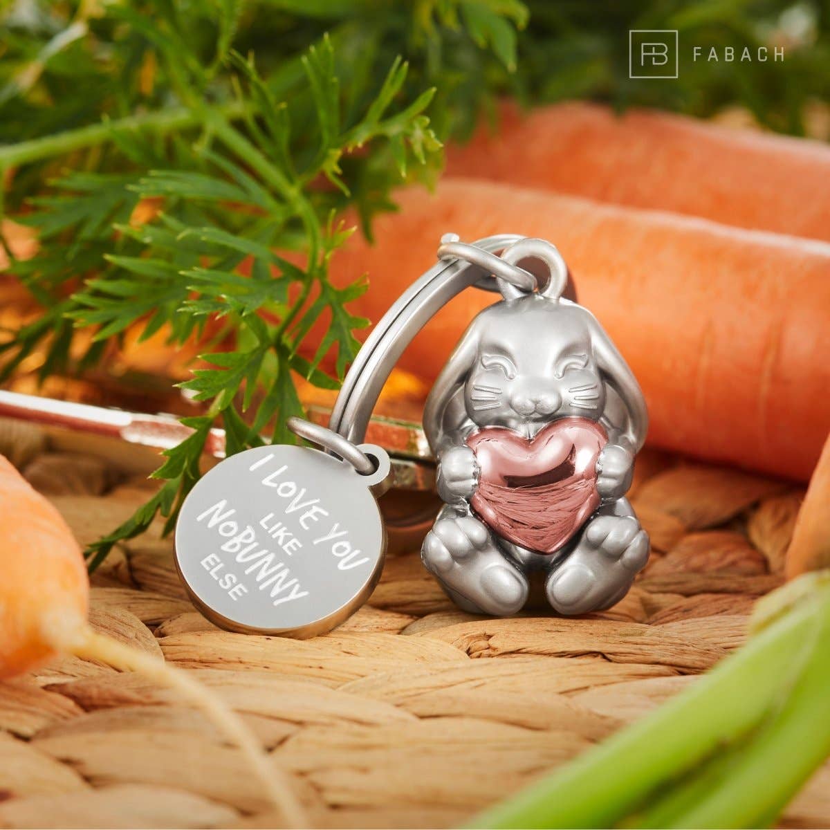 "I love you like no bunny else" bunny-shaped keychain with engraving. Cute lucky charm with a heart