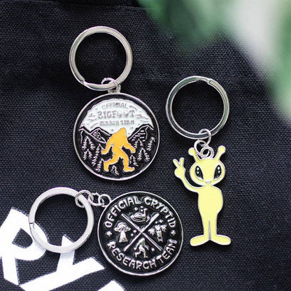 Cryptid research team keychain