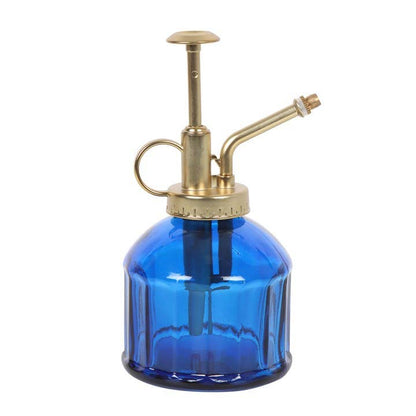 Petit vaporisateur en verre bleu pour plantes