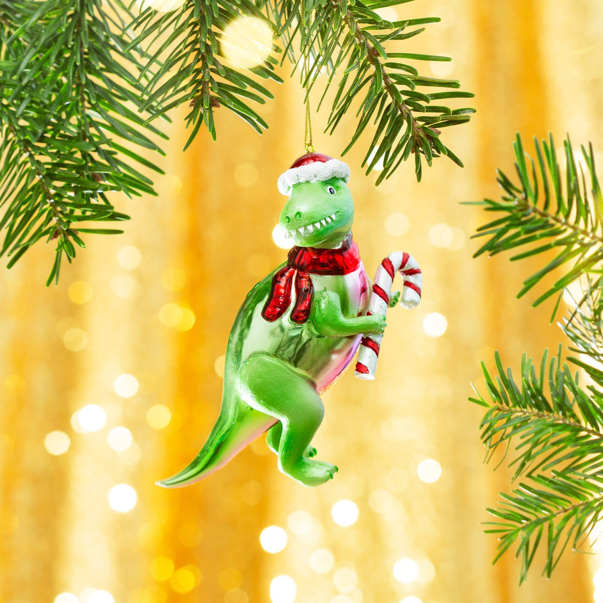 Pallina di Natale T-Rex con bastoncino di zucchero
