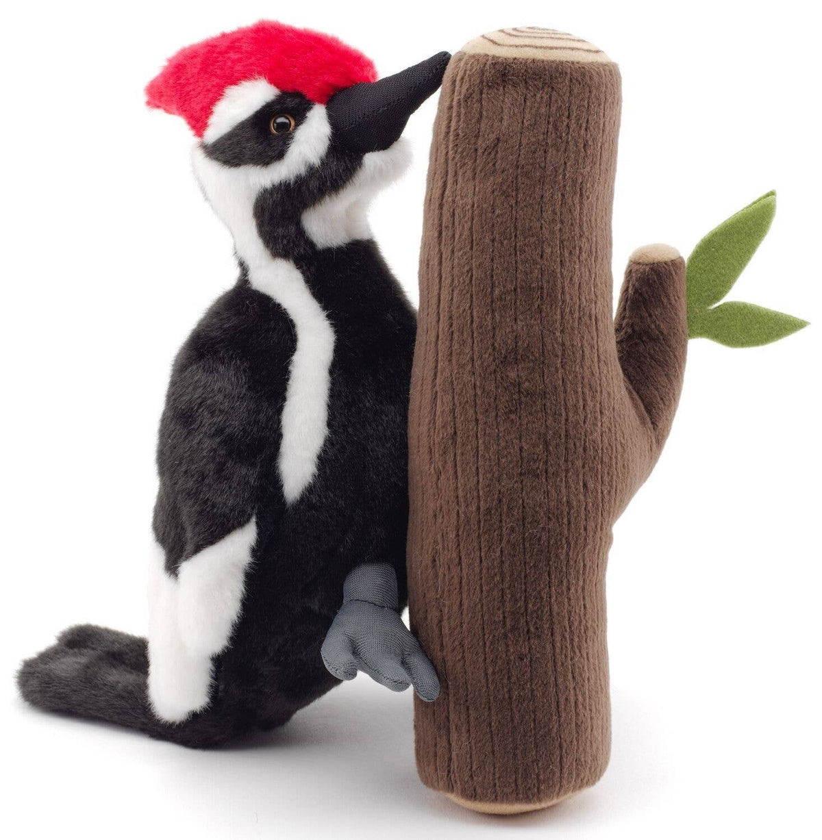 Peluche pivert sur le tronc