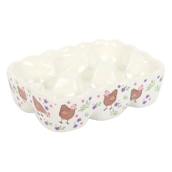 Ceramic egg holder with floral hen design