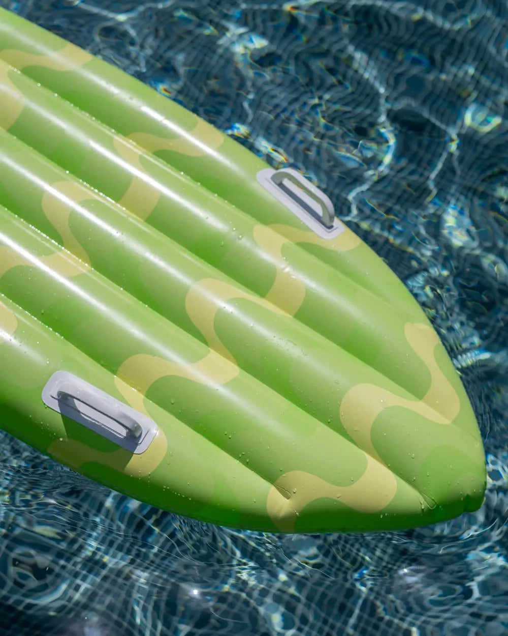 Green surfboard float - AUSTIN
