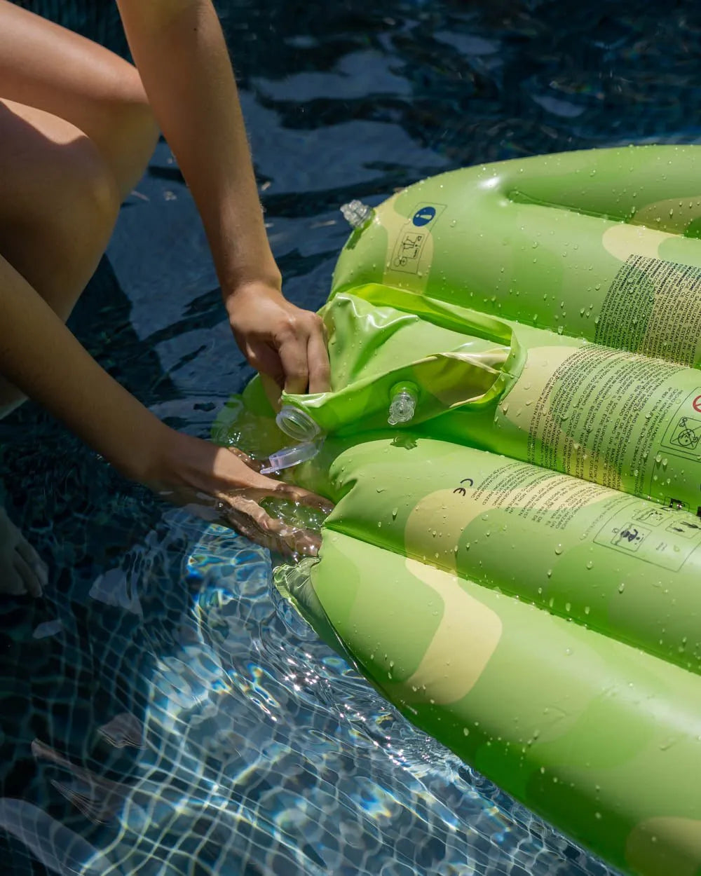 Green surfboard float - AUSTIN
