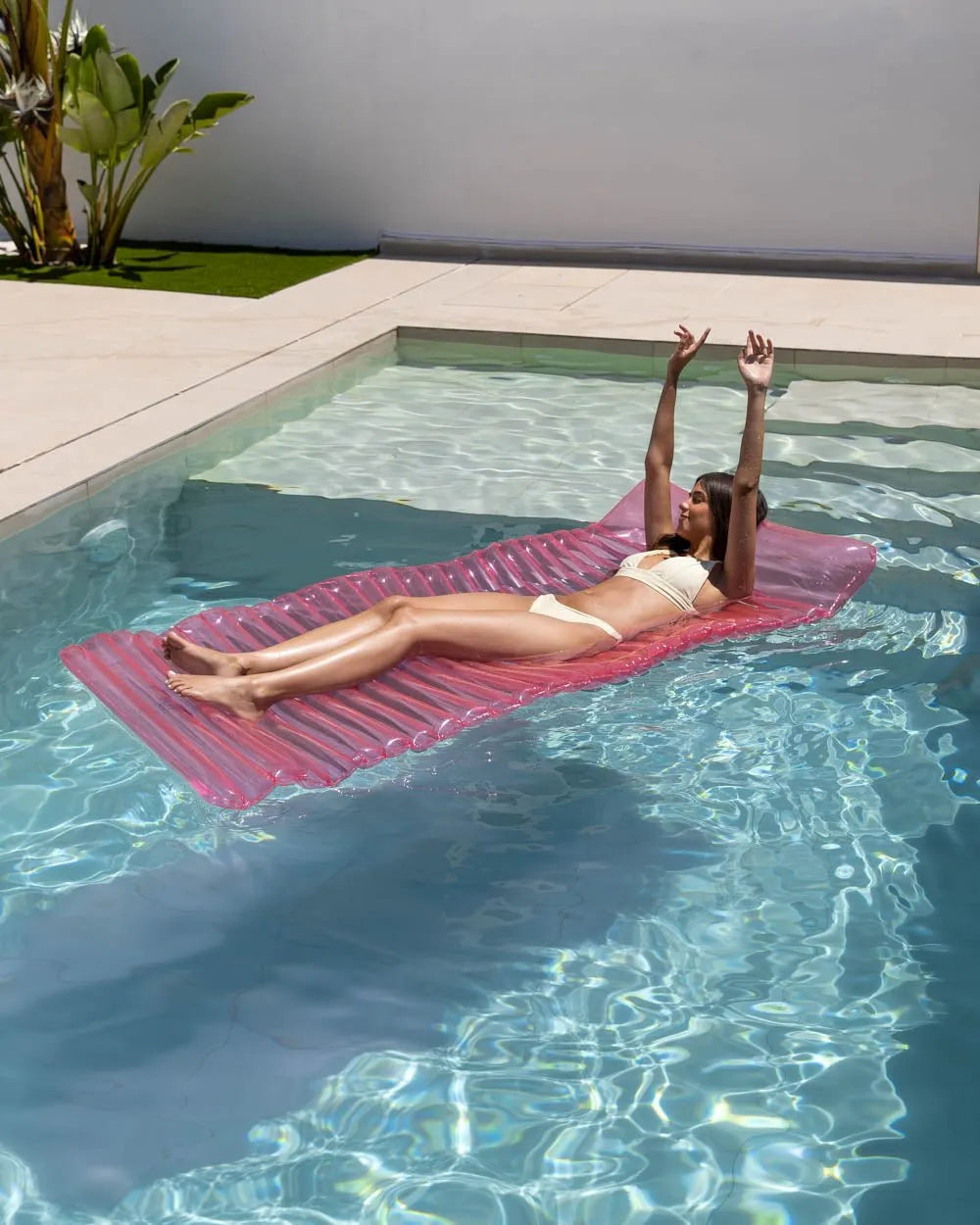 Pink lounging float - MILOS