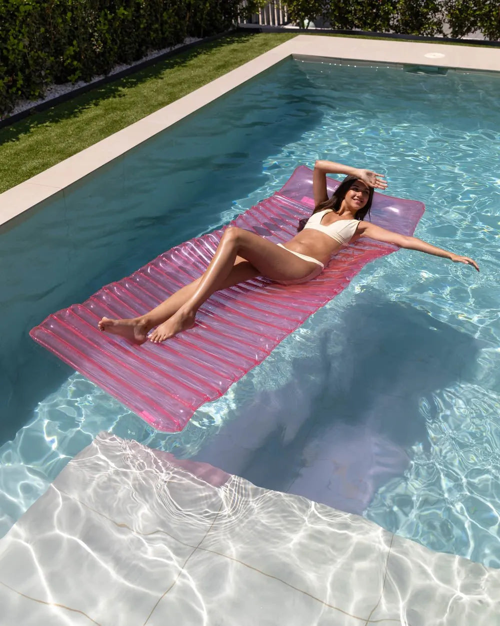 Pink lounging float - MILOS