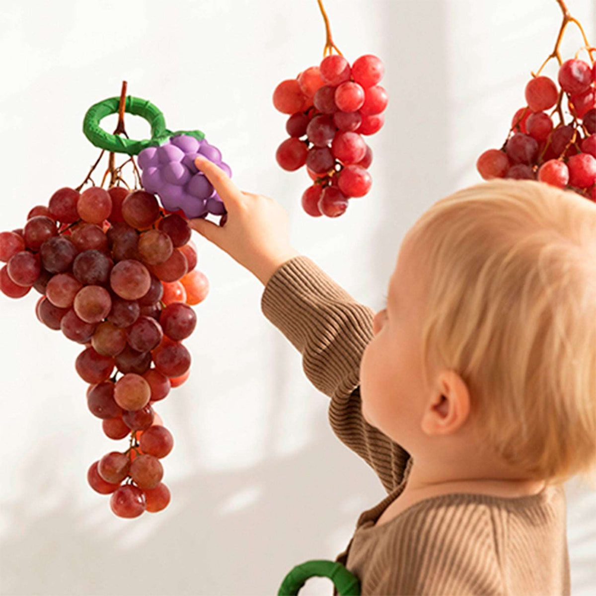 Hochet en forme de raisin