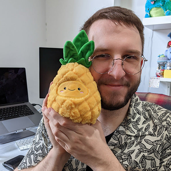 Peluche Snacker Squishable – Ananas