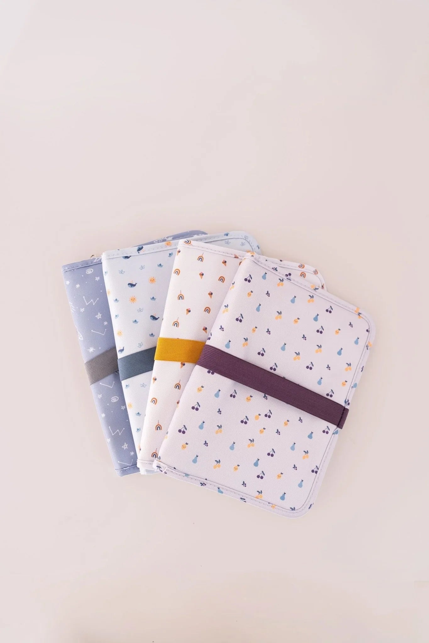 Diaper bag with integrated changing mat