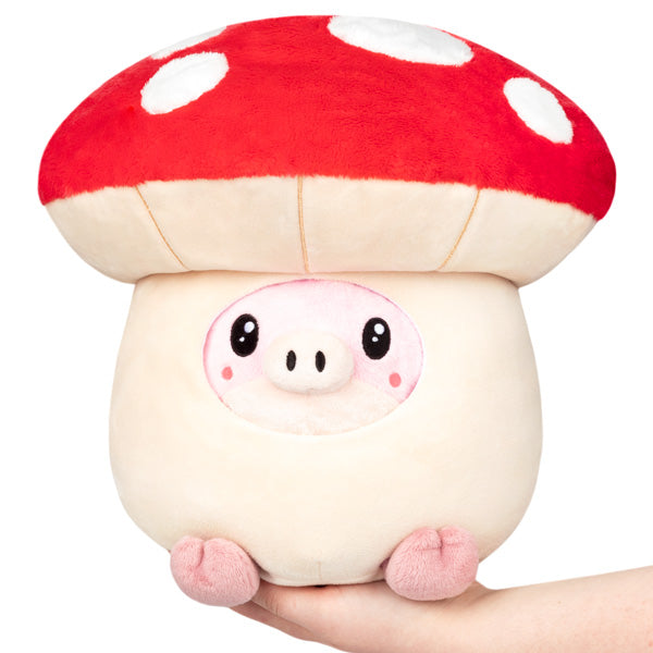 Cochon caché dans un champignon
