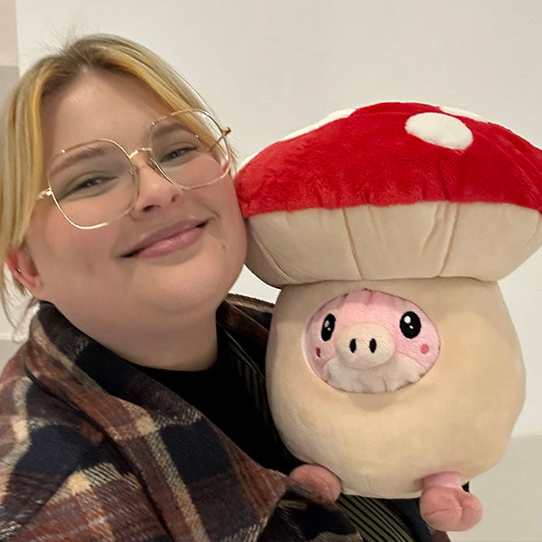 Cochon caché dans un champignon